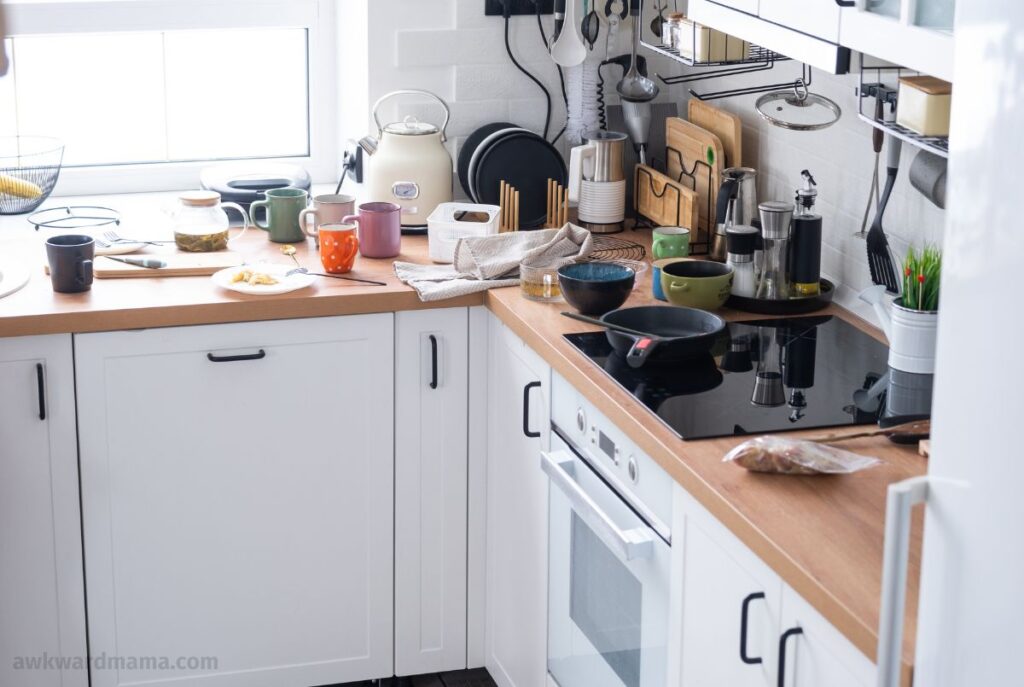 Cluttered kitchen counter showing household mess before starting a daily cleaning routine